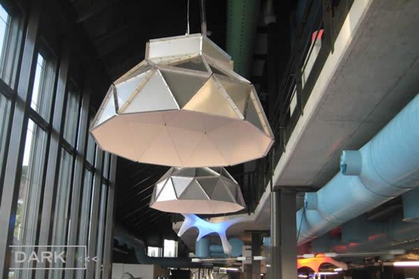 Designed by the Dutch designer Romy Kühne, the impressive Apollo, has a heavy industrial look-and-feel with metal triangles, nuts and bolts.  Apollo produces a superb soft white light, almost like velvet! The magical mix between industrial roughness and sweet soft light, makes the Apollo unique. 