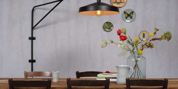 An eye-catching wall light. Matt black with copper shade 